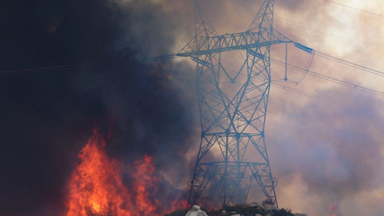 Power lines have been damaged by the wildfires, causing homes and businesses to lose power