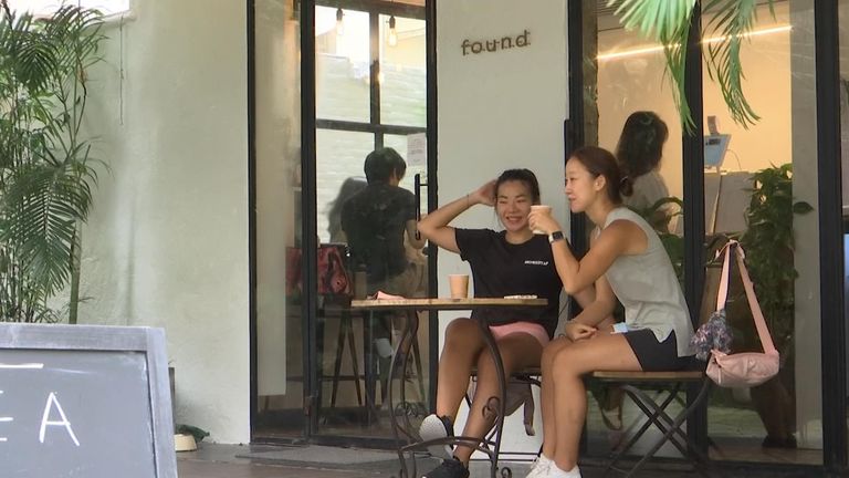 Two patrons of the Found Cafe enjoy a coffee