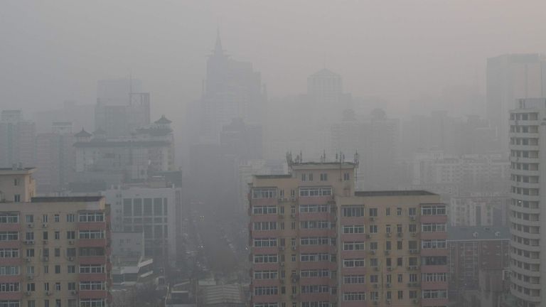 Buildings are seen on a polluted day in Beijing on January 18, 2020. (Photo by NICOLAS ASFOURI / AFP) (Photo by NICOLAS ASFOURI/AFP via Getty Images)