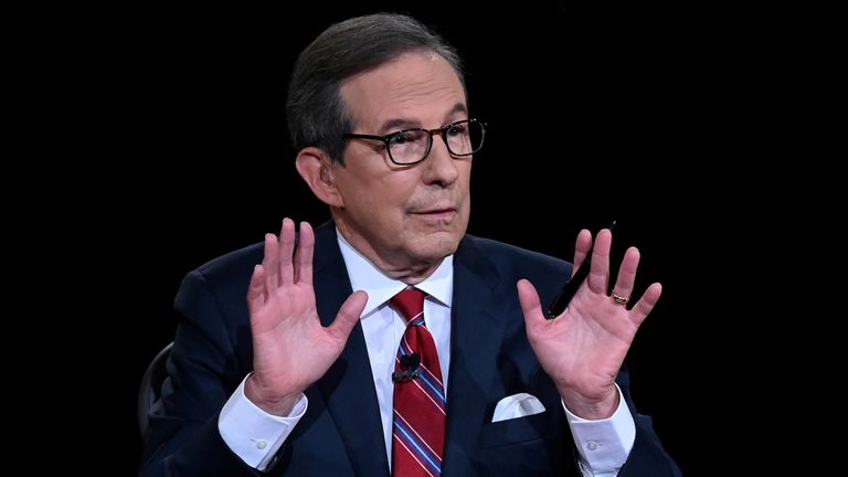 Debate moderator and Fox News anchor Chris Wallace directs the first 2020 presidential campaign debate b
