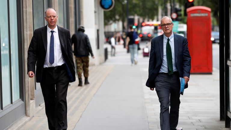 Chief Medical Officer for England Chris Whitty is seen walking alongside Chief Scientific Adviser Sir Patrick Vallance, amid the outbreak of the coronavirus disease (COVID-19), in London, Britain, September 9, 2020. REUTERS/Peter Nicholls