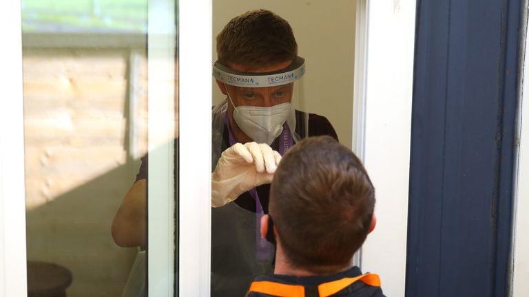 BALLYMENA, NORTHERN IRELAND - SEPTEMBER 23: A mandatory Covid-19 test is carried out on an attendee ahead of the Dubai Duty Free Irish Open at Galgorm Spa & Golf Resort on September 23, 2020 in Ballymena, Northern Ireland. (Photo by Warren Little/Getty Images)
