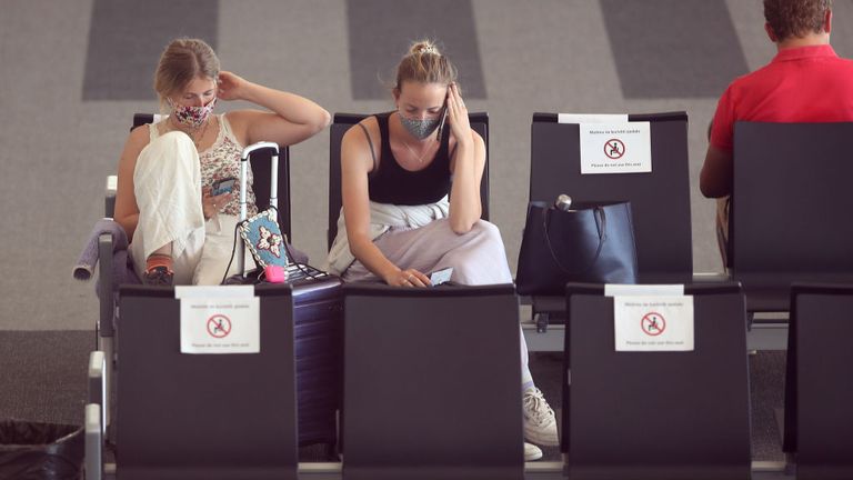 Holidaymakers are seen at an airport in Croatia last month after the country was added to the UK&#39;s quarantine list