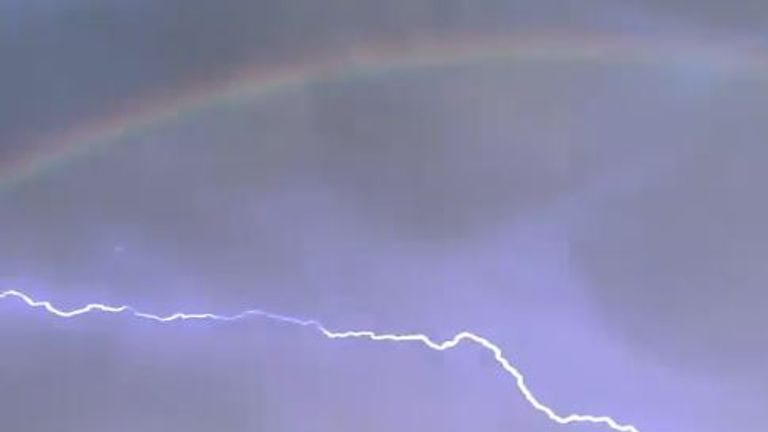 Double rainbow joined in sky by lightning strike | World News | Sky News