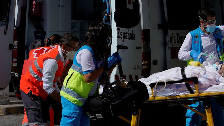 Emergency teams treat a patient in Madrid