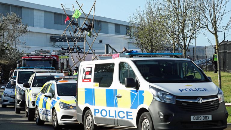 Police and fire services outside the Newsprinters printing works at Broxbourne, Hertfordshire, as protesters use bamboo lock-ons continue to block the road