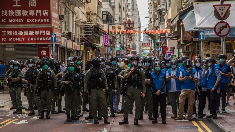 Police patrol the area after protesters called for a rally in Hong Kong on September 6, 2020 to protest against the government&#39;s decision to postpone the legislative council election due to the COVID-19 coronavirus, and the national security law