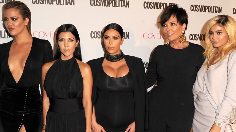 (R-L) Khloe, Kourtney and Kim Kardashian work the red carpet with Kris and Kylie Jenner in 2015