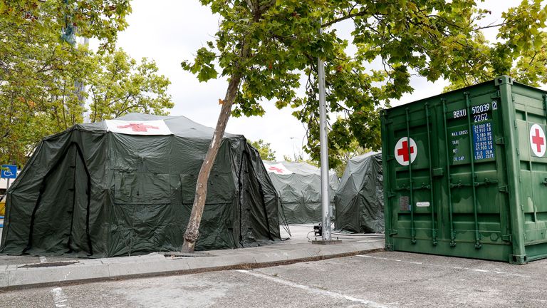 Triage tents installed outside a Madrid military hospital