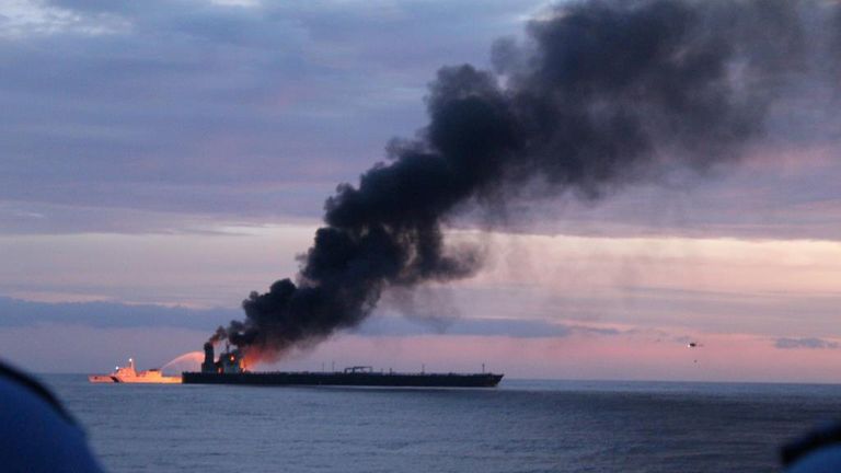The New Diamond, a very large crude carrier (VLCC) chartered by Indian Oil Corp (IOC) that was carrying the equivalent of about 2 million barrels of oil, is seen after a fire broke out, off the east coast of Sri Lanka September 3, 2020. Picture taken September 3, 2020. Sri Lankan Navy media/Handout via REUTERS ATTENTION EDITORS - THIS IMAGE WAS PROVIDED BY A THIRD PARTY. NO RESALES. NO ARCHIVES.