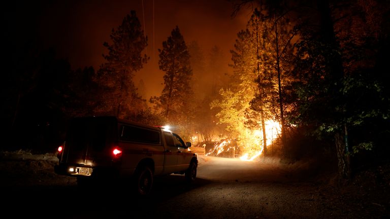 Burning vegetation near Lake Oroville as wildfires rage across California