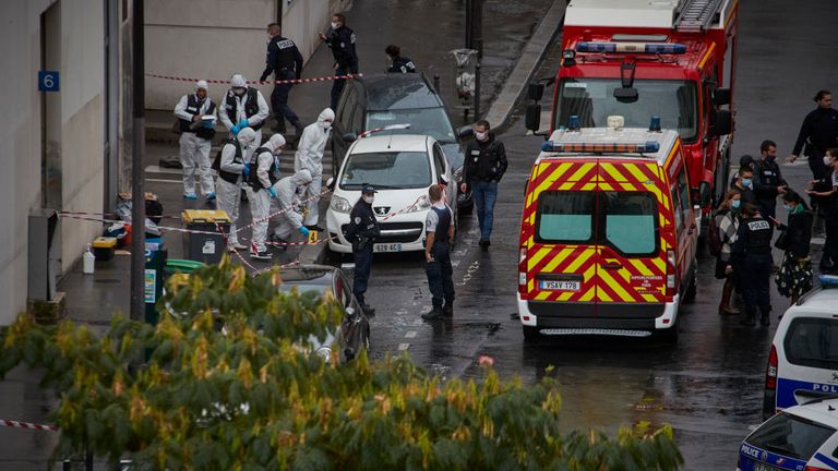 Two people have been left injured after a knife attack near the old offices of Charlie Hebdo