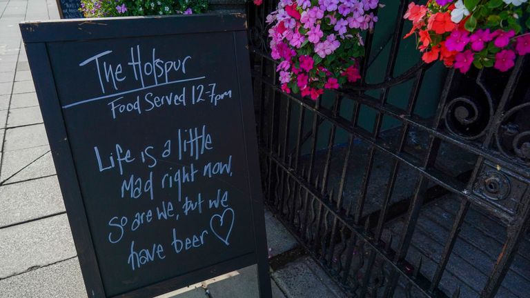 A sign is displayed outside a pub in Newcastle on September 17, 2020 in Newcastle upon Tyne, England