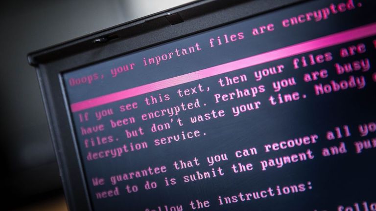 A laptop displays a message after being infected by a ransomware as part of a worldwide cyberattack on June 27, 2017 in Geldrop. The unprecedented global ransomware cyberattack has hit more than 200,000 victims in more than 150 countries, Europol executive director Rob Wainwright said May 14, 2017. Britain&#39;s state-run National Health Service was affected by the attack. / AFP PHOTO / ANP / Rob Engelaar / Netherlands OUT (Photo credit should read ROB ENGELAAR/AFP via Getty Images)
