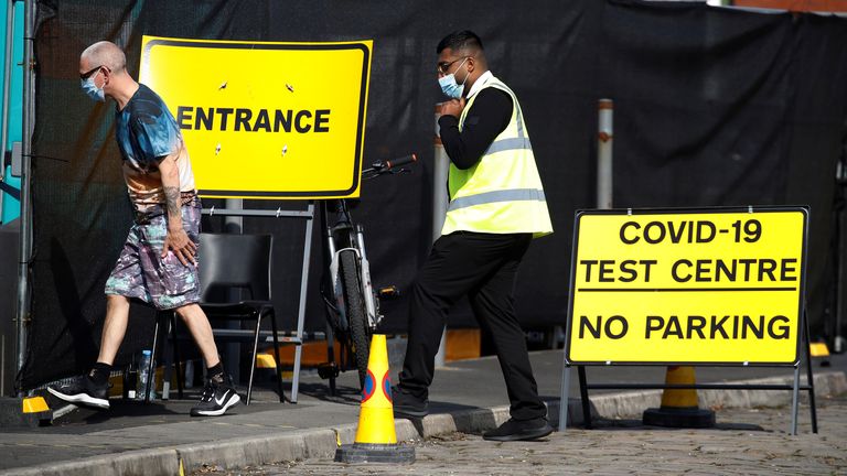 A man arrives at a walk-in test facility following the outbreak of the coronavirus disease (COVID-19) in the Farnworth area of Bolton, Britain, September 15, 2020. REUTERS/Phil Noble