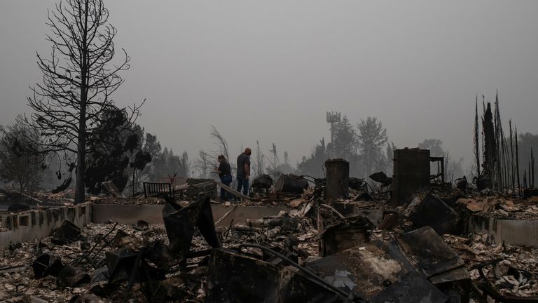 A couple in Oregon find their home destroyed by wildfires