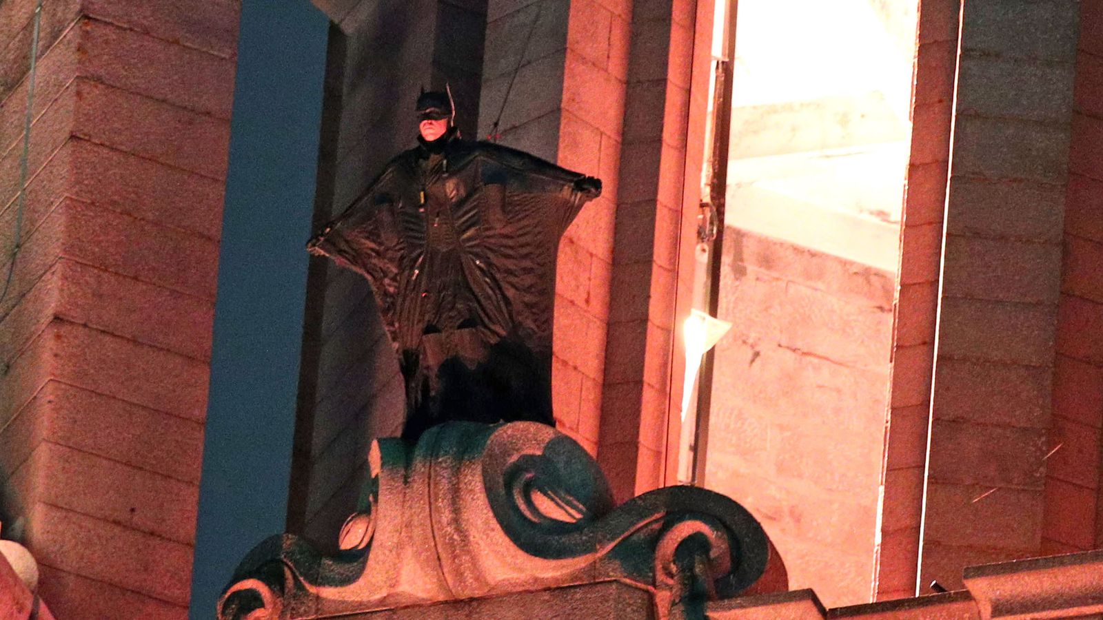 Stunt double scales Liverpool landmark as filming for new Batman movie  continues | UK News | Sky News