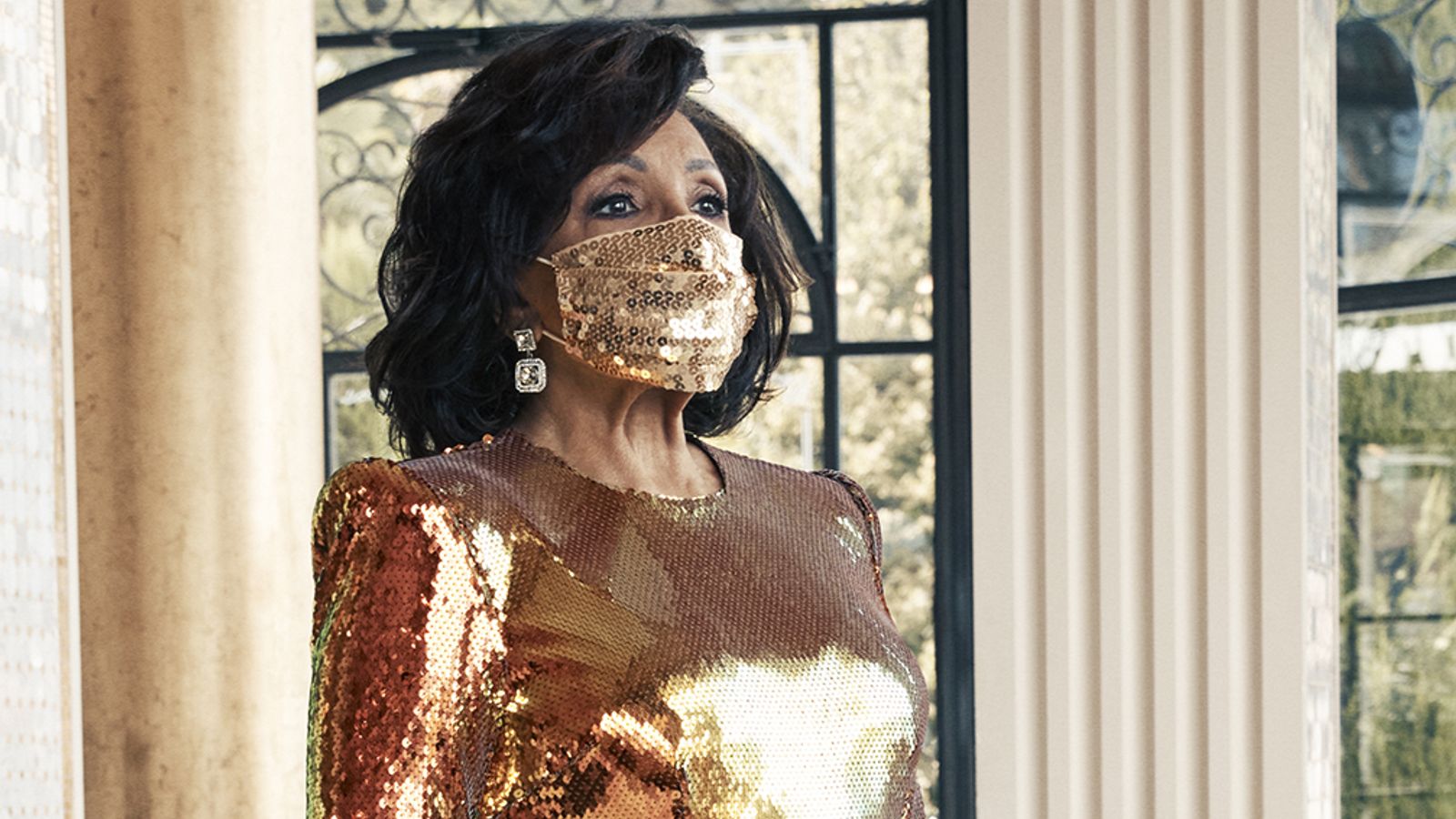 Shirley Bassey slips into sequin face mask to celebrate 70 years in ...