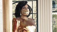 EMBARGOED TO 0001 FRIDAY OCTOBER 16 Undated handout photo of Dame Shirley Bassey, 83, wearing a matching face mask and sequined gold gown during a photo shoot in Italy for her forthcoming new album &#39;Owe It All To You&#39;.