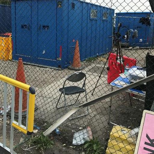 Migrants held at "building site"