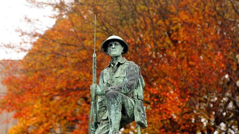 A soldier of the Great War on the War Memorial at Shildon, County Durham, against a backdrop of trees in autumn colour, as the nation prepares to remember its fallen service men and women with Remembrance Services to be held across the UK over the next few days.
