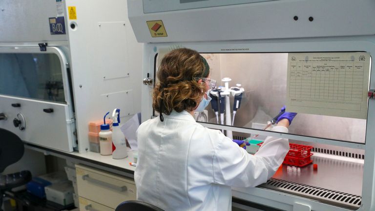 A scientist at work during a visit by the Duke of Cambridge to the manufacturing laboratory where a vaccine against COVID-19 has been produced at the Oxford Vaccine Group's facility at the Churchill Hospital in Oxford.