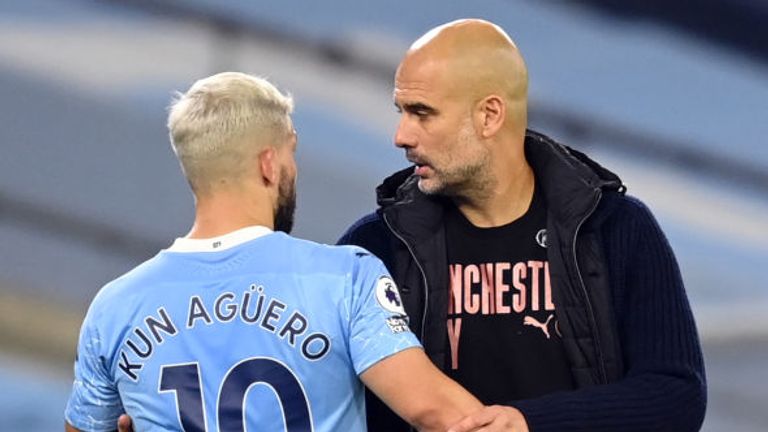 Manchester City&#39;s Argentinian striker Sergio Aguero (L) is substituted by Manchester City&#39;s Spanish manager Pep Guardiola during the English Premier League football match between Manchester City and Arsenal at the Etihad Stadium in Manchester, north west England, on October 17, 2020. (Photo by Michael Regan / POOL / AFP) / RESTRICTED TO EDITORIAL USE. No use with unauthorized audio, video, data, fixture lists, club/league logos or &#39;live&#39; services. Online in-match use limited to 120 images. An ad