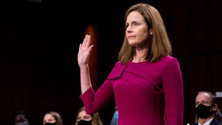 WASHINGTON, DC - OCTOBER 12: Supreme Court Justice nominee Judge Amy Coney Barrett is sworn in during the Senate Judiciary Committee confirmation hearing for Supreme Court Justice in the Hart Senate Office Building on October 12, 2020 in Washington, DC. With less than a month until the presidential election, President Donald Trump tapped Amy Coney Barrett to be his third Supreme Court nominee in just four years. If confirmed, Barrett would replace the late Associate Justice Ruth Bader Ginsburg. 