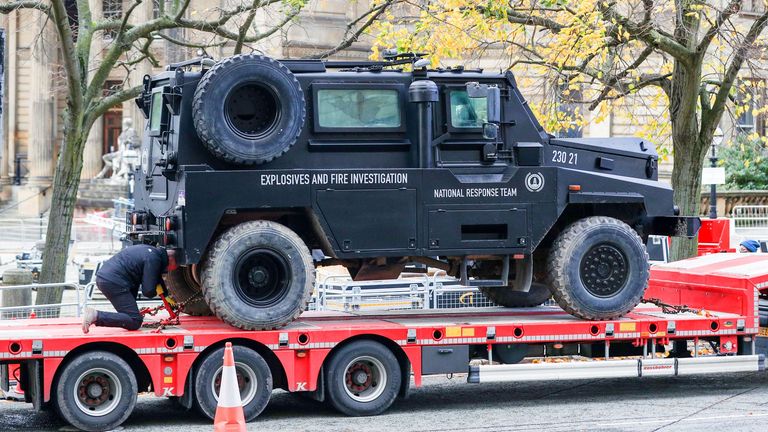 A prop is brought to the set during the filming of The Batman taking place in Liverpool
