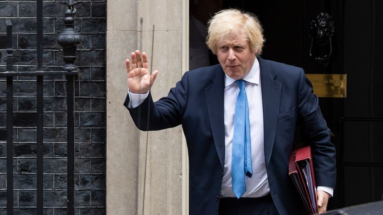 British Prime Minister Boris Johnson leaves 10 Downing Street to attend the weekly Prime Minister&#39;s Questions on June 17, 2020 in London, England. Yesterday Boris Johnson announced the government would continue to provide free school meal vouchers to eligible children throughout the summer holidays, following a petition by Manchester United footballer, Marcus Rashford.