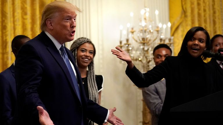 Candace Owens with Donald Trump at a Young Black Leadership Summit at the White House in October 2019.