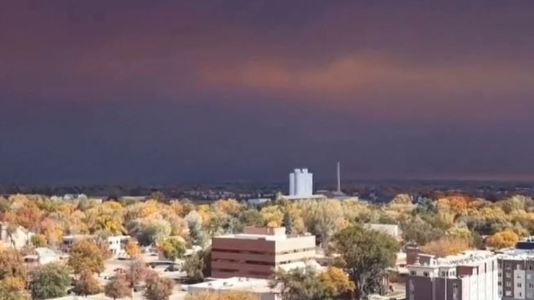 Colorado sky is darkened by smoke from largest fire in state&#39;s history 