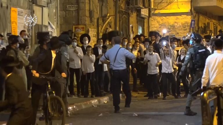 Israeli police clashed with hundreds of ultra-Orthodox Jews as they sought to enforce restrictions during a coronavirus lockdown