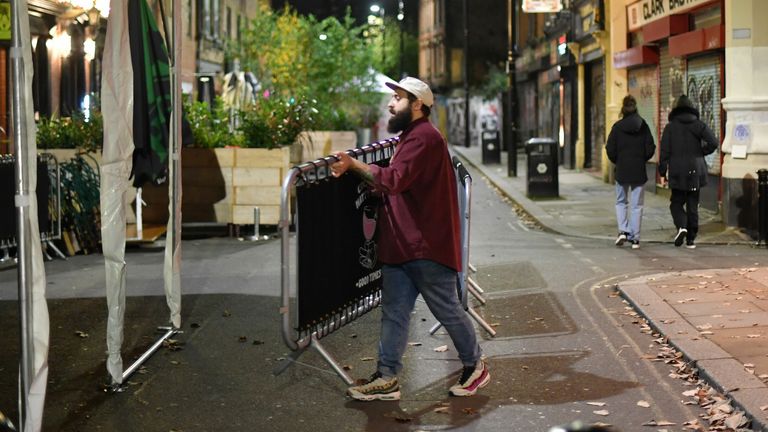 A business in Manchester packs up ahead of the city&#39;s new lockdown measures