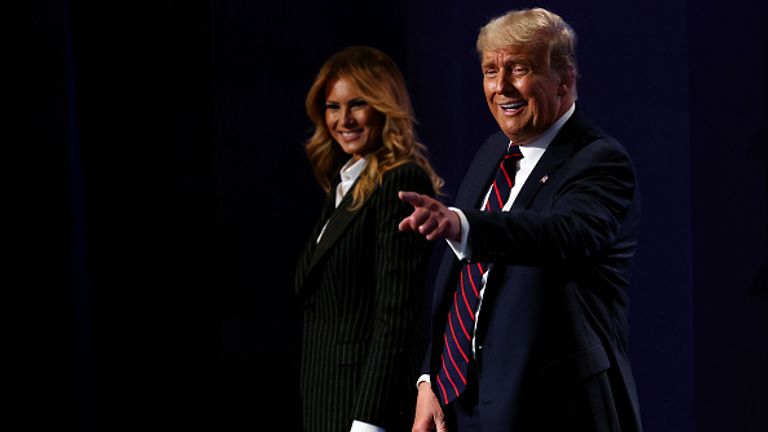 The Trumps are pictured on stage together during Tuesday&#39;s TV debate in Cleveland