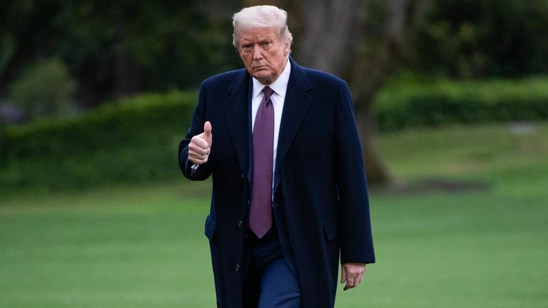 US President Donald Trump gives a thumbs up as he walks from Marine One after arriving on the South Lawn of the White House in Washington, DC, October 1, 2020, following campaign events in New Jersey. (Photo by SAUL LOEB / AFP) (Photo by SAUL LOEB/AFP via Getty Images)