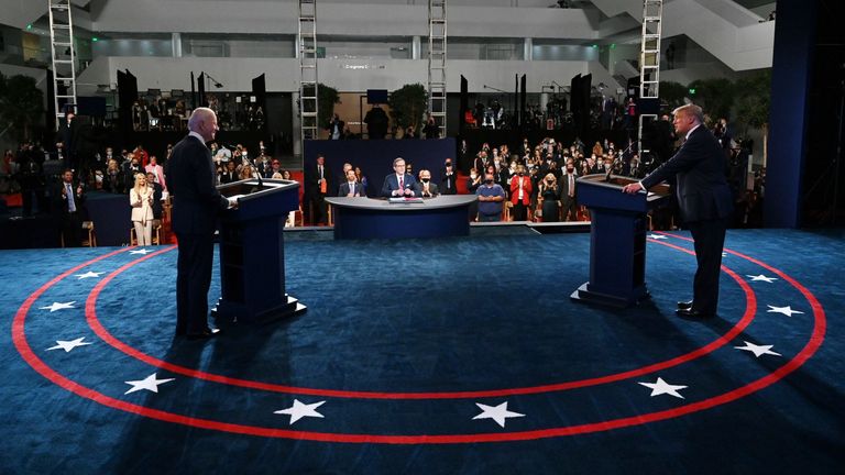 US President Donald Trump (R) and Democratic presidential candidate Joe Biden arrive for the first presidential debate at Case Western Reserve University and Cleveland Clinic in Cleveland, Ohio, on September 29, 2020. (Photo by olivier DOULIERY / POOL / AFP) (Photo by OLIVIER DOULIERY/POOL/AFP via Getty Images)