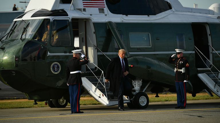 US President Donald Trump steps off Marine One on his way to board Air Force One before departing from Andrews Air Force Base in Maryland on October 1, 2020. - The president is heading to Bedminster, New Jersey for a fundraiser. (Photo by MANDEL NGAN / AFP) (Photo by MANDEL NGAN/AFP via Getty Images)