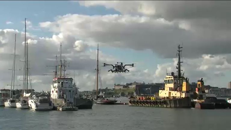 A drone is pictured being tested above the port