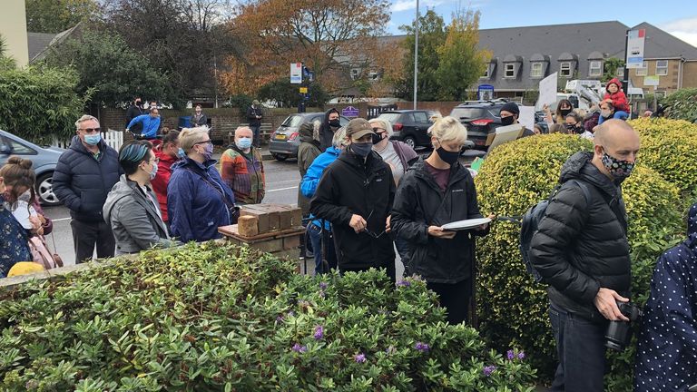 People leaving empty plates outside a Conservative MP Sir David Amess Southend offices in protest over the party voting against plans to extend free school meals over holidays.