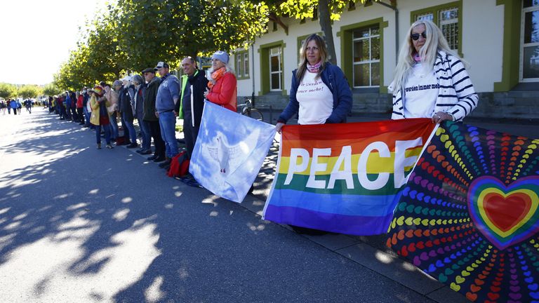 Peace protesters formed a chain as far-right groups marched
