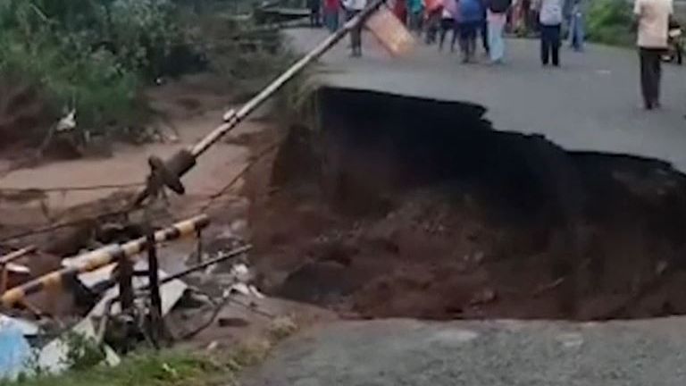 Road collapses after heavy flooding in Indian city