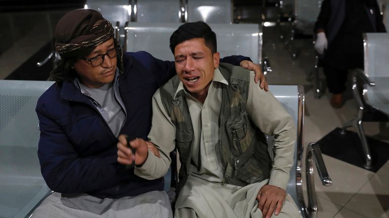 An Afghan man who lost his brother mourns at a hospital after a suicide bombing in Kabul, Afghanistan October 24, 2020.REUTERS/Mohammad Ismail
