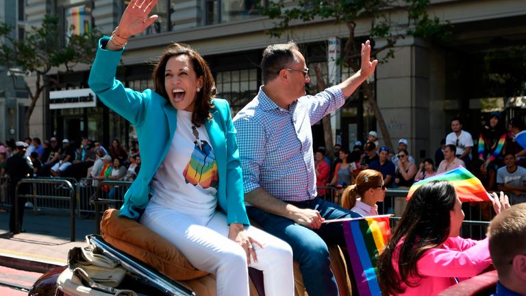 Kamala Harris waves to the crowd during the San Francisco gay pride in 2018