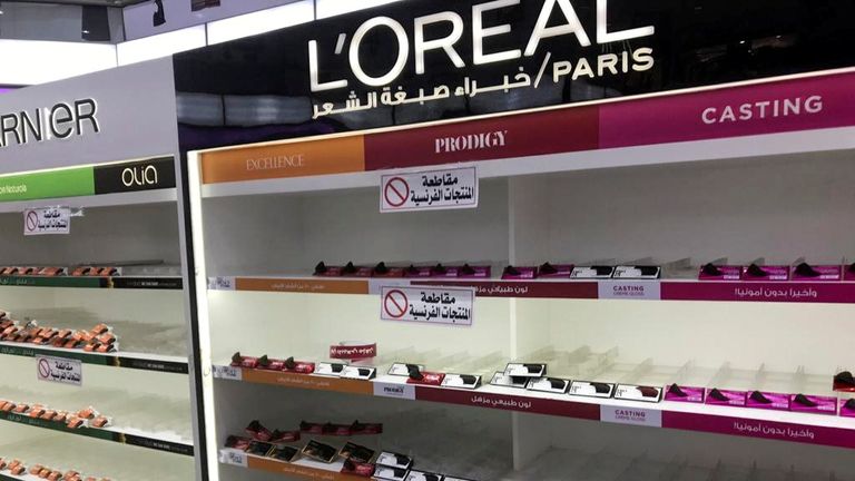 Empty shelves are seen where French products were displayed in a Kuwaiti supermarket