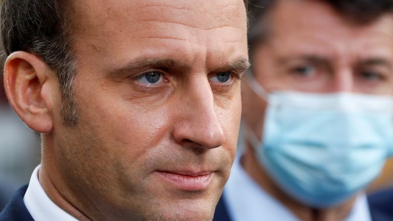 French President Emmanuel Macron looks on as he speaks to the media during the visit to the scene of a knife attack at Notre Dame church in Nice, France October 29, 2020. REUTERS/Eric Gaillard/Pool
