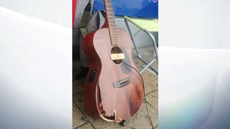 The guitar that was previously owned by Mr Grant. It was smashed after a woman "accosted" him in the street. Pic: Matt Grant