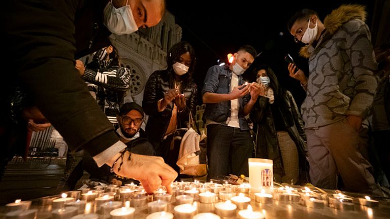 Locals in Nice light candles outside the basilica where the attack occurred