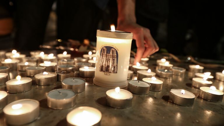 Candles have been lit outside the church