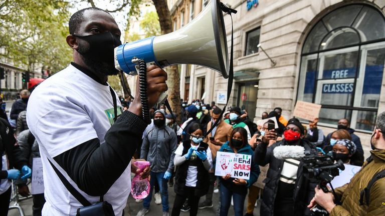 Protesters against SARS in London on 11 October